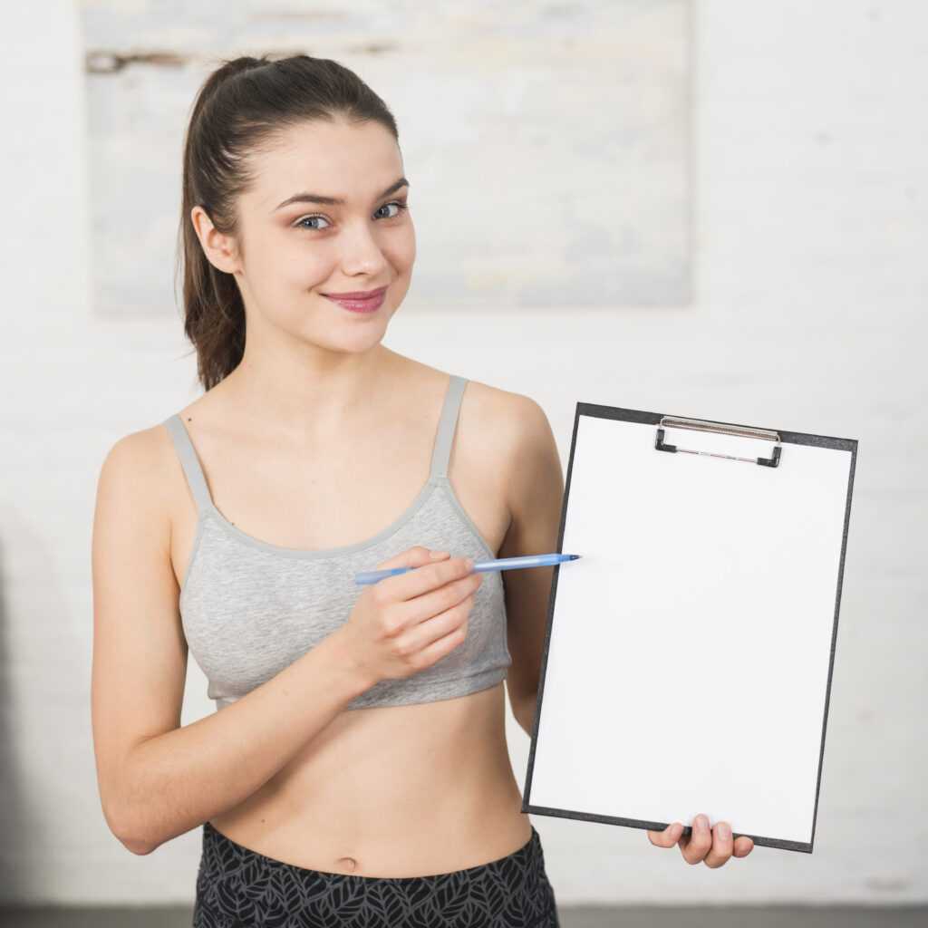 fitness-girl-showing-folder